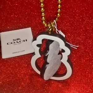 BNWT Coach spinning snowman hang tag